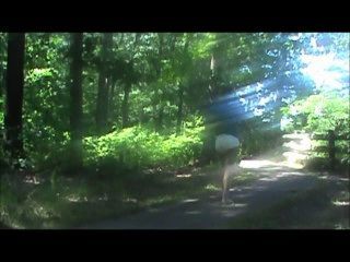 Walking Down A Trail In A Shirt And Diaper