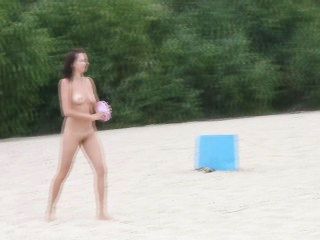 Young Nudist Friends Naked Together At The Beach