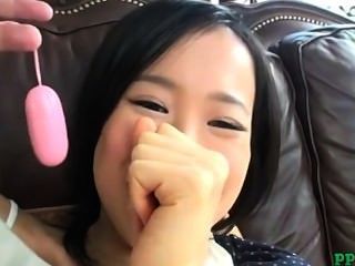 Asian Young Getting Her Hairy Pussy Stimulated With Vibrator On The Couch